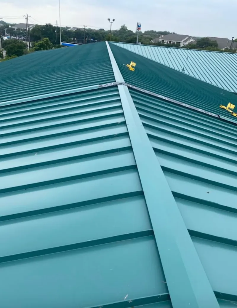 Green commercial metal roof ridge and valley for Metal Roof Repair in Progress Village